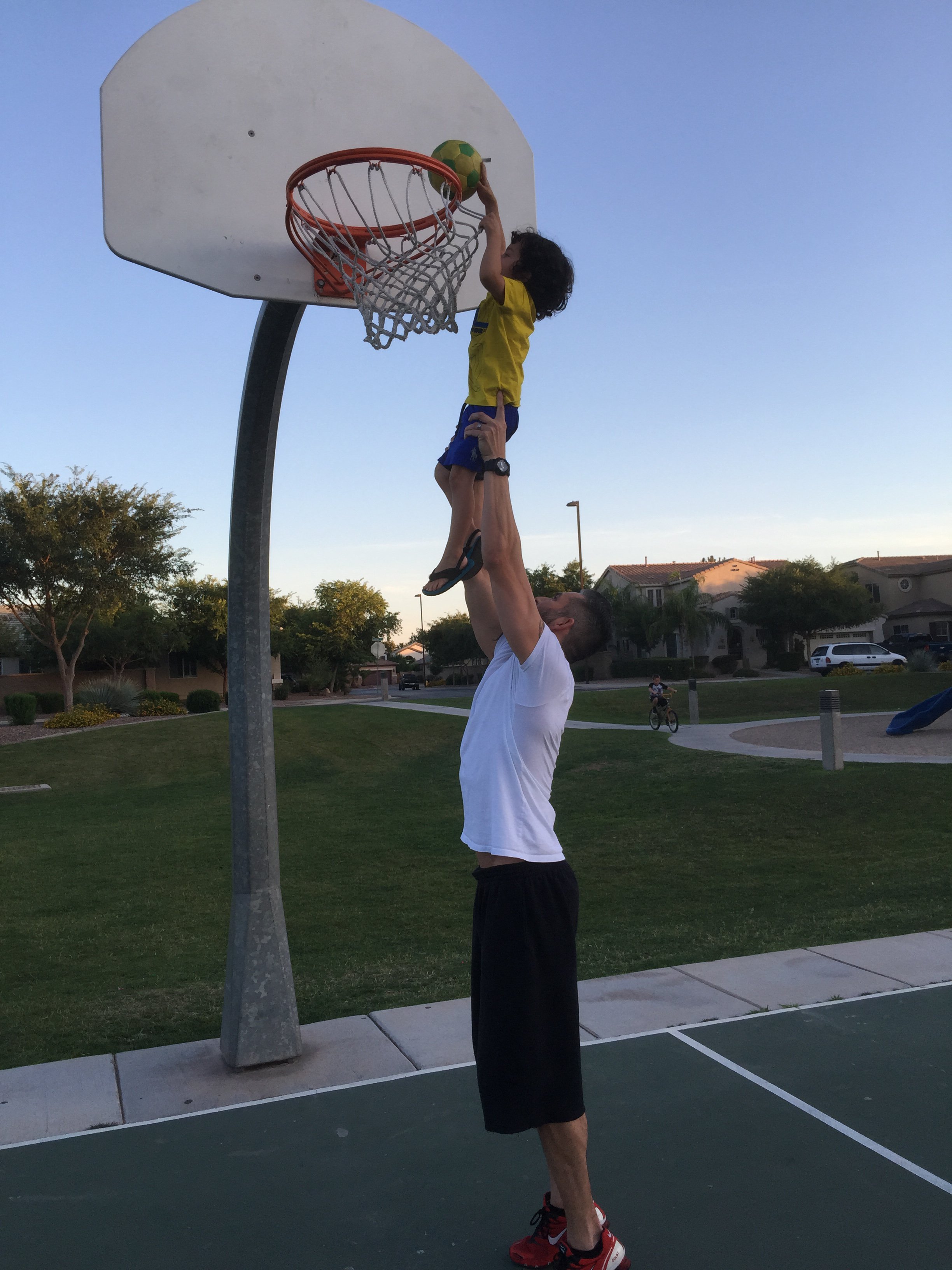 Chase being lifted to dunk