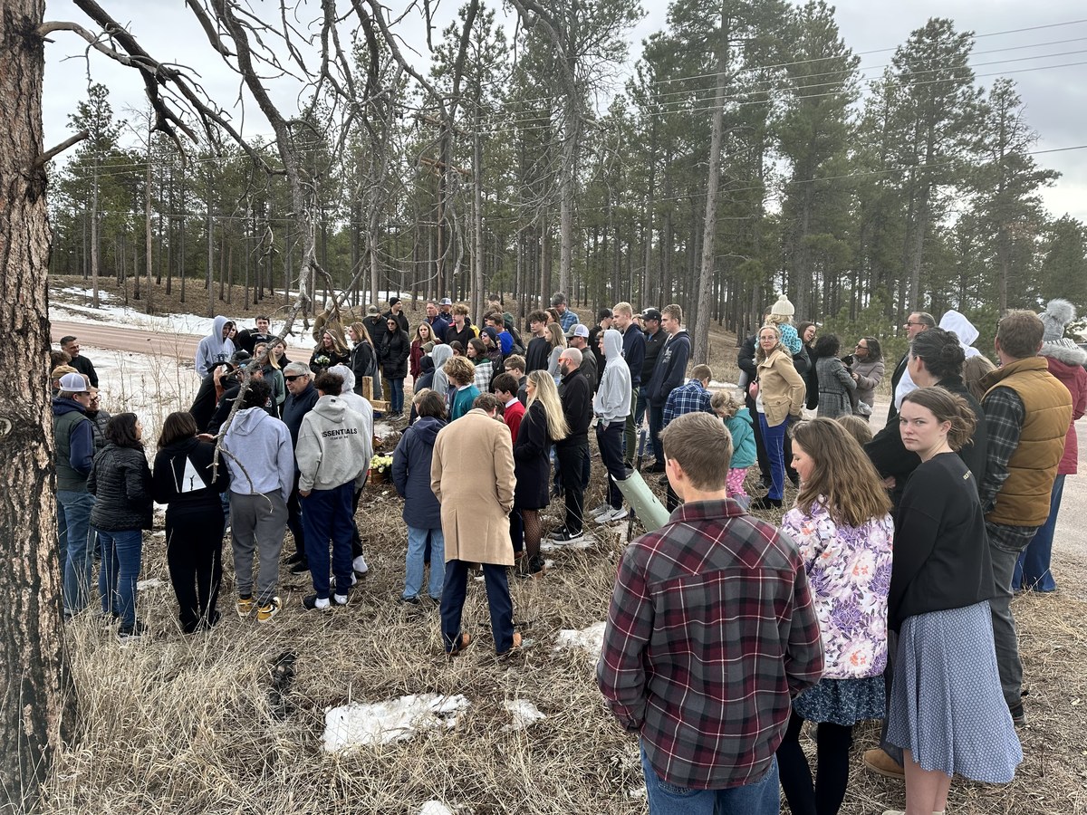 Family and friends gathered at Chase's roadside memorial