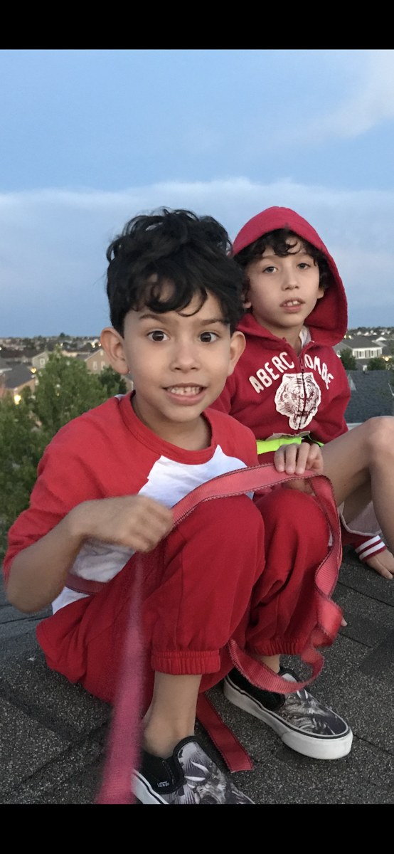 Chase and his brother on the rooftop