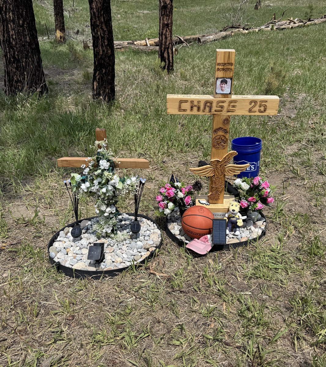 Chase's memorial site with flowers and his basketball